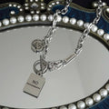 Damen Kette mit einzigartigem Charm und verspieltem Anhänger Shop Nory