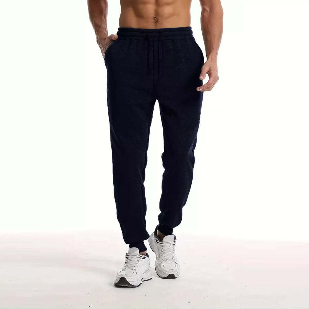 Unisex nan athleisure Jogginghose mit innen angerautem Fleece, elastischem Kordelbund und gerippten Knöchelabschlüssen Shop Nory