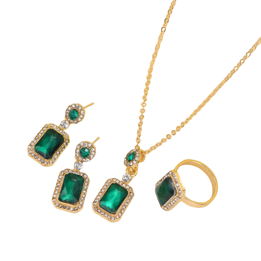 Damen Schmuckset mit funkelnden Smaragd und goldenen Akzenten Shop Nory