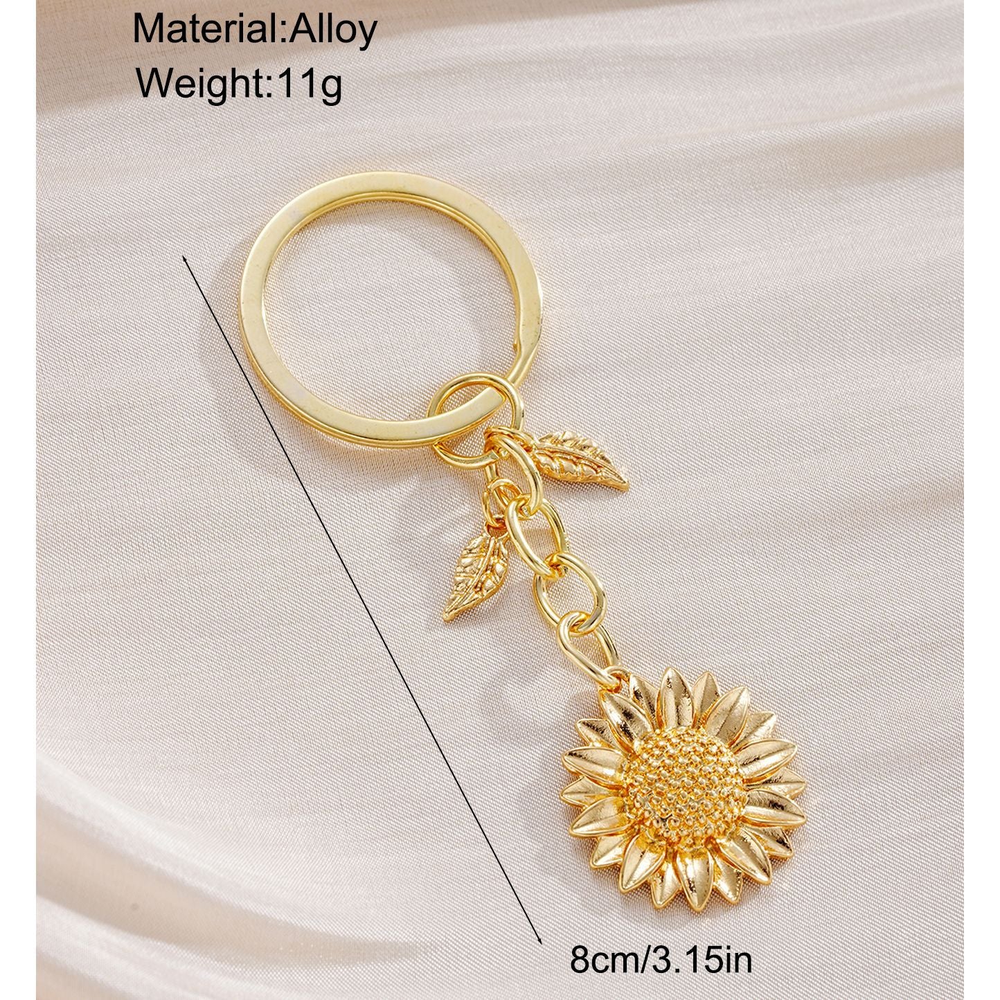 Damen Schlüsselanhänger mit filigranem Sonnenblumen-Design und elegantem Blattakzent Shop Nory