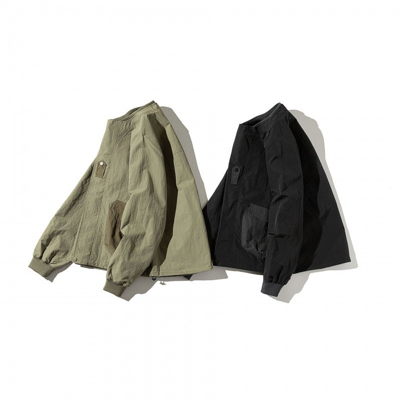 Unisex Kurz geschnittene Boxy-Utility-Überjacke mit Raglanärmeln, aufgesetzten Pattentaschen und Kordelzugsaum Shop Nory