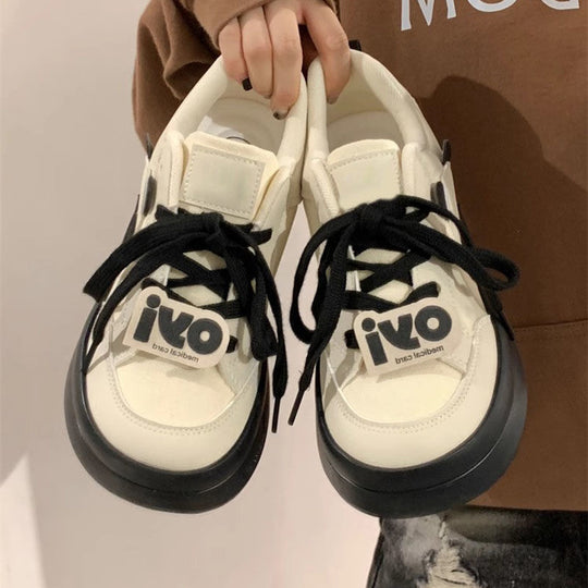 Damen Retro-Canvas-Plateau-Sneaker mit markanter Gummisohle und Logo-Detail Shop Nory