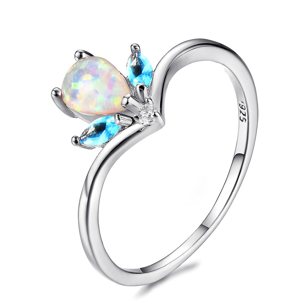 Damen Ring mit elegantem tropfenförmigem Opal und funkelnden Zirkonia Shop Nory