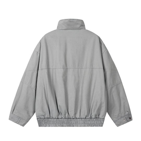 Unisex Boxy-Fieldjacke mit hohem Stehkragen, Pattentaschen und elastischem Saum Shop Nory