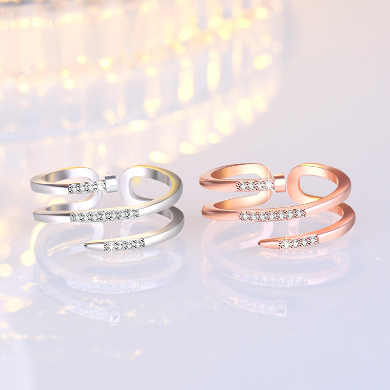 Damenring mit kunstvollem Wellen-Design und funkelnden Zirkonia Shop Nory