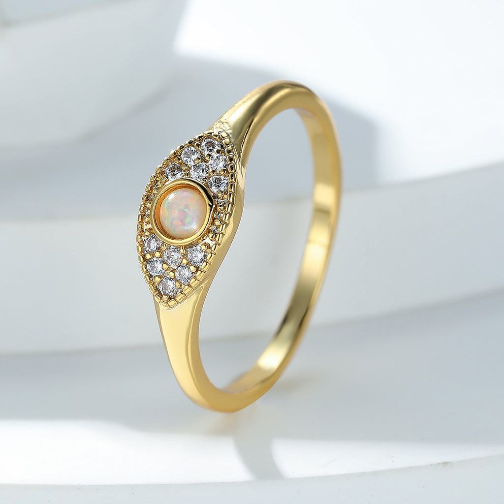 Damen Ring mit funkelndem Opal-Motiv und kunstvollen Zirkonia-Verzierungen Shop Nory