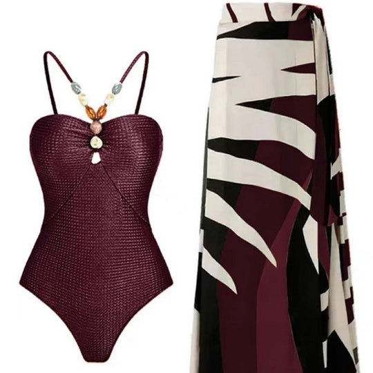 Damen Badeanzug mit elegantem Wickelrock und modischen Schmuckdetails