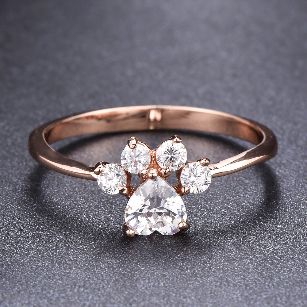 Damen Ring mit funkelndem orangefarbenem Stein und floralem Design Shop Nory