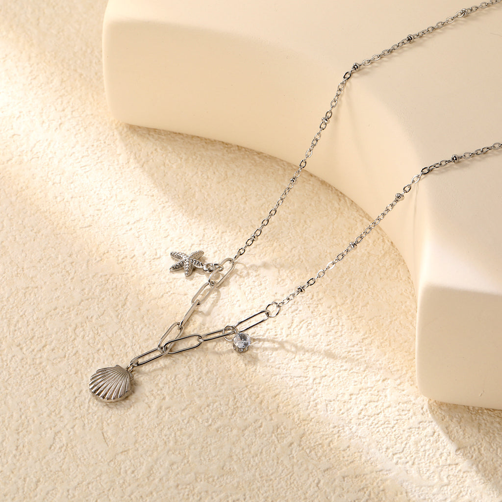 Damen Halskette mit maritimem Muschel- und Sternenanhänger Shop Nory