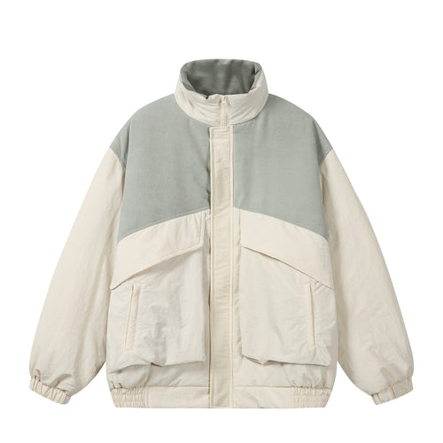 Unisex Boxy-Pufferblouson mit hohem Stehkragen, Cord-Schulterpasse und großen Pattentaschen Shop Nory