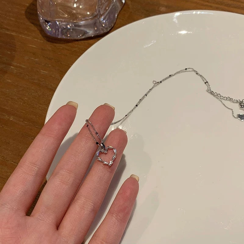 Damen Halskette mit filigranem Herzanhänger und funkelnden Zirkonia Shop Nory