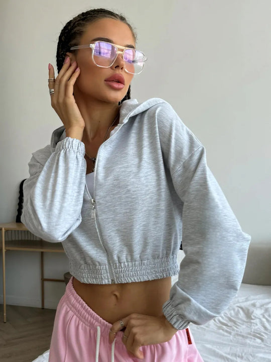 Damen Kurzgeschnittene Kapuzenjacke mit Reißverschluss, elastischem Bund und legerer Passform Shop Nory