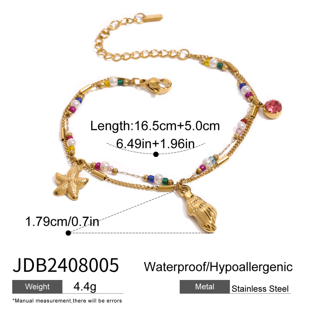 Damen Armkette mit maritimem Design und eleganten Muschel-Elementen Shop Nory