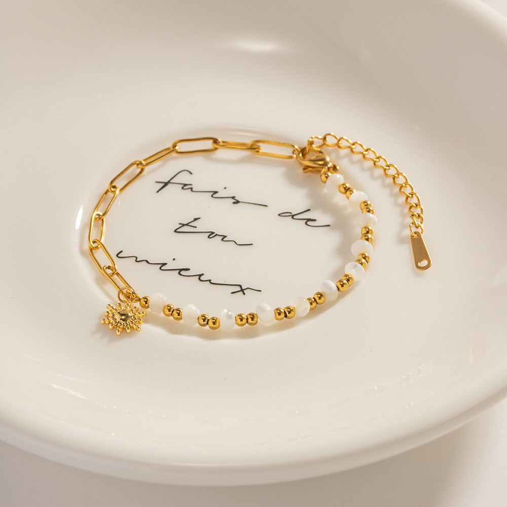 Damen Armband mit elegantem Perlen-Design und funkelndem Anhänger Shop Nory