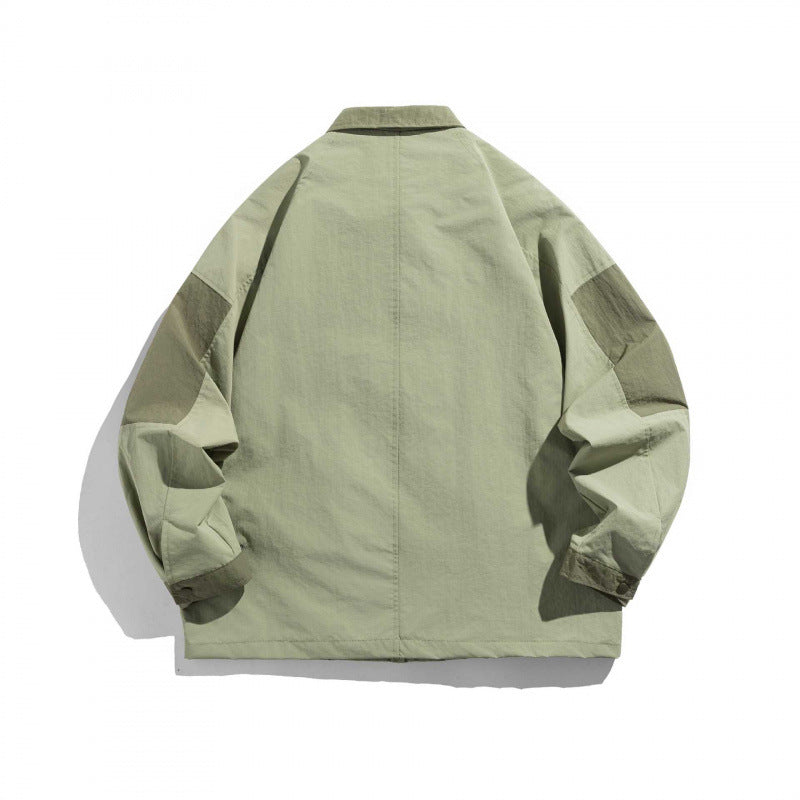 Unisex Oversize Utility-Fieldjacke mit aufgesetzten Taschen, Kontrastpaneelen und versteckter Reißverschlussleiste Shop Nory