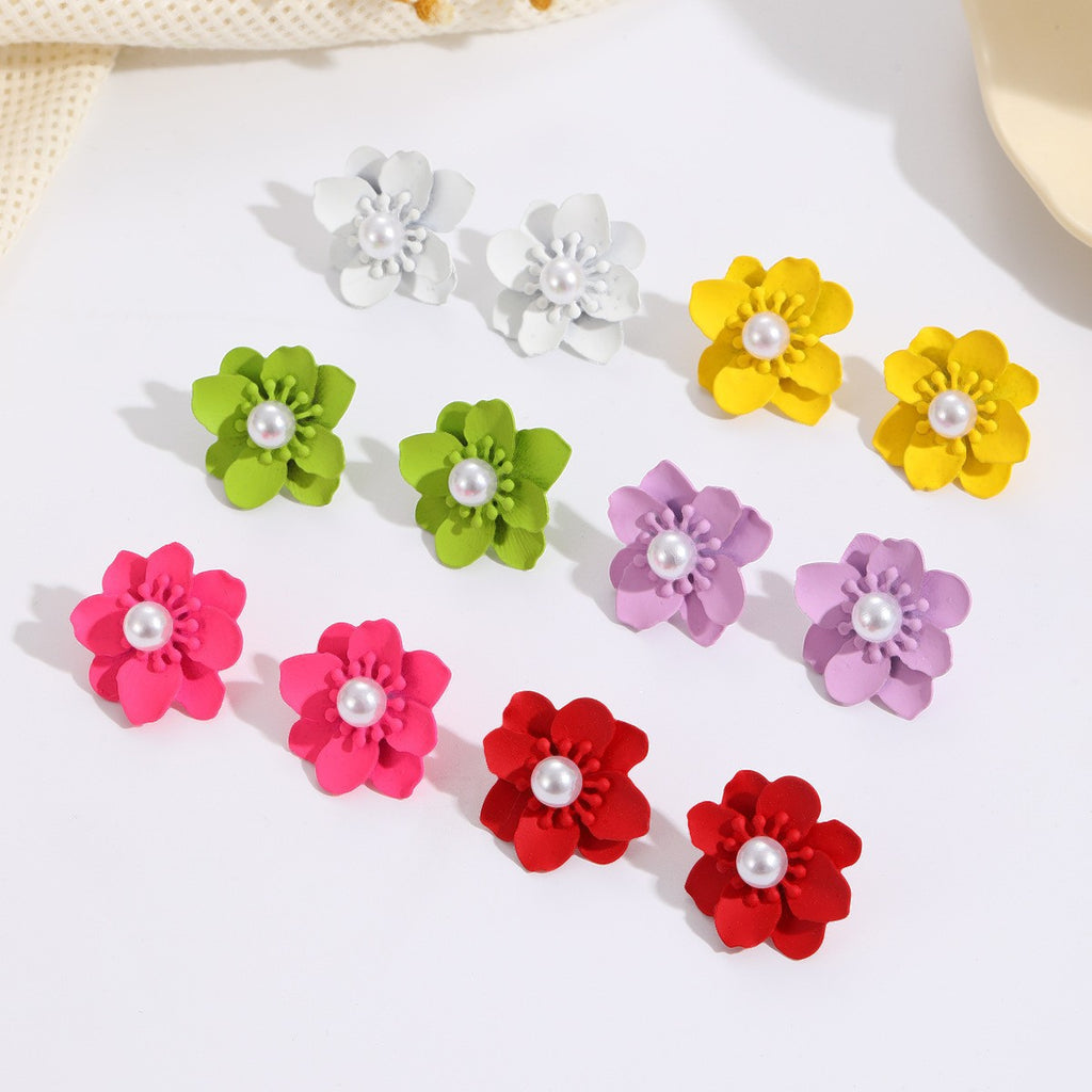 Damen Ohrringe mit kunstvollem Blumenmotiv und Perlenakzent Shop Nory