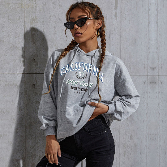 Damen Relaxed-Fit Hoodie mit Collegestyle-Frontprint und Kängurutasche Shop Nory