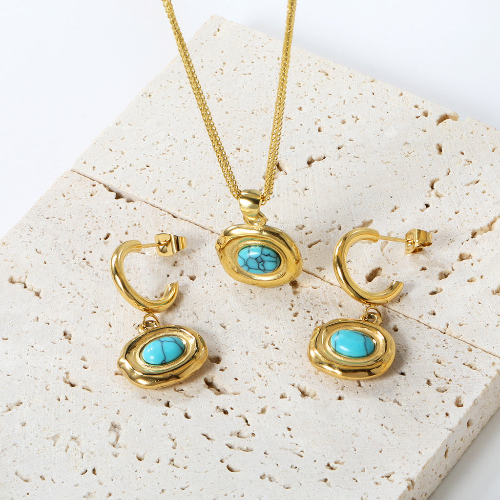 Damen Halskette mit goldplattiertem Anhänger und türkisfarbenem Stein Shop Nory