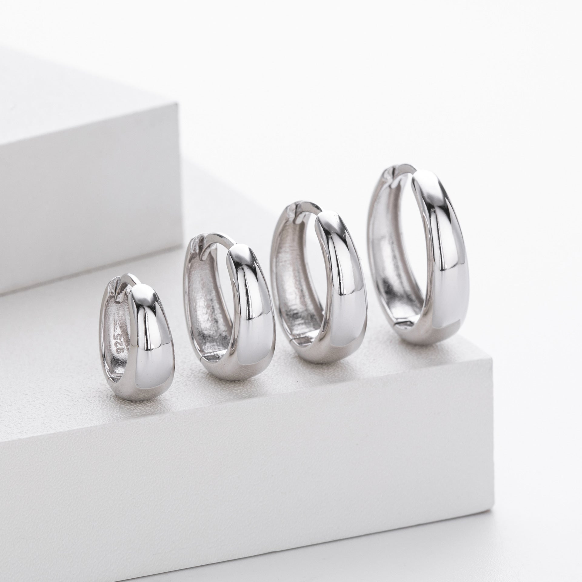 Damen Creolen mit elegantem geschwungenen Design aus 925 Sterling Silber Shop Nory