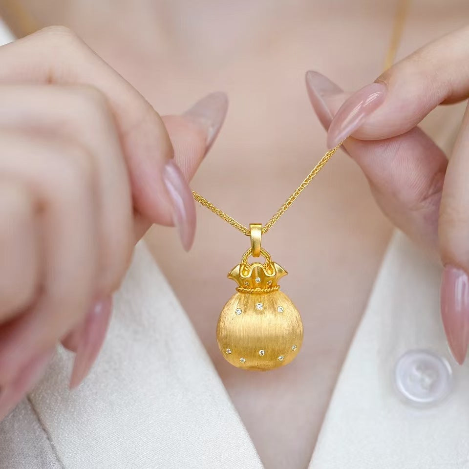 Damen Anhänger im eleganten Geldbeutel-Design mit funkelnden Kristallen Shop Nory