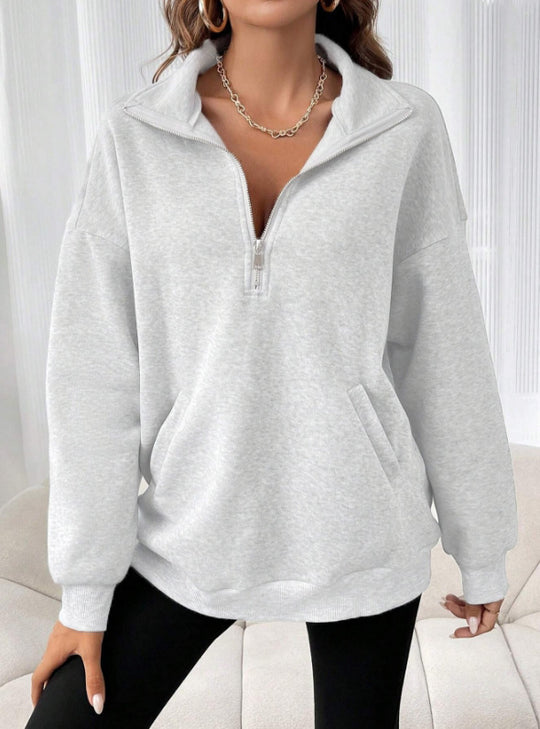Damen Oversize Sweatshirt mit halbem Reißverschluss, Kängurutasche und Stehkragen Shop Nory