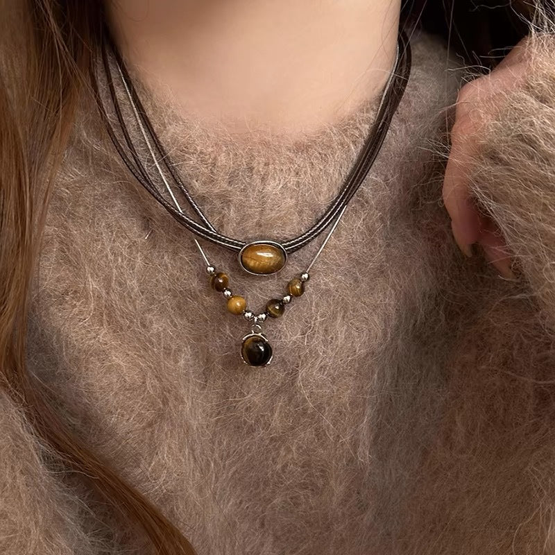 Damen Halskette mit elegantem ovalem Anhänger und hochwertigem Lederband Shop Nory
