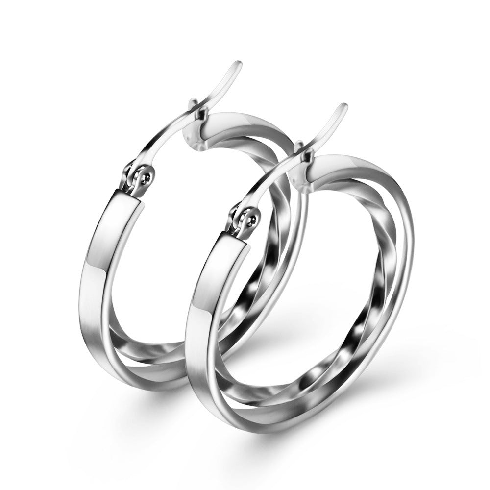 Damen Creolen aus hochwertigem Edelstahl mit elegantem, gewundenem Design Shop Nory