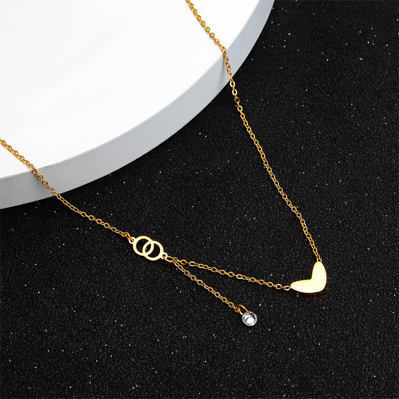 Damen Halskette mit herzförmigem Anhänger und funkelndem Element Shop Nory