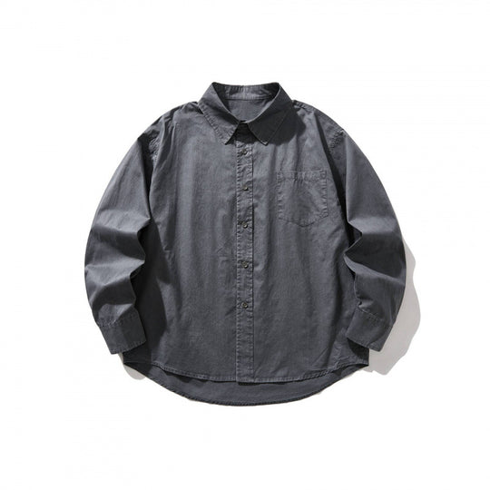 Unisex Oversize-Denim-Hemdjacke mit kastiger Silhouette, Brusttasche und gerundetem Saum Shop Nory
