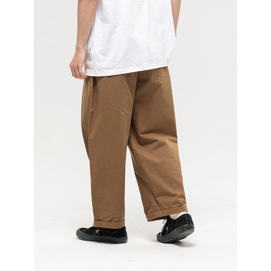 Damen Weite High‑Waist Bundfalten-Hose mit elastischem Kordelbund und gekrempeltem Saum Shop Nory