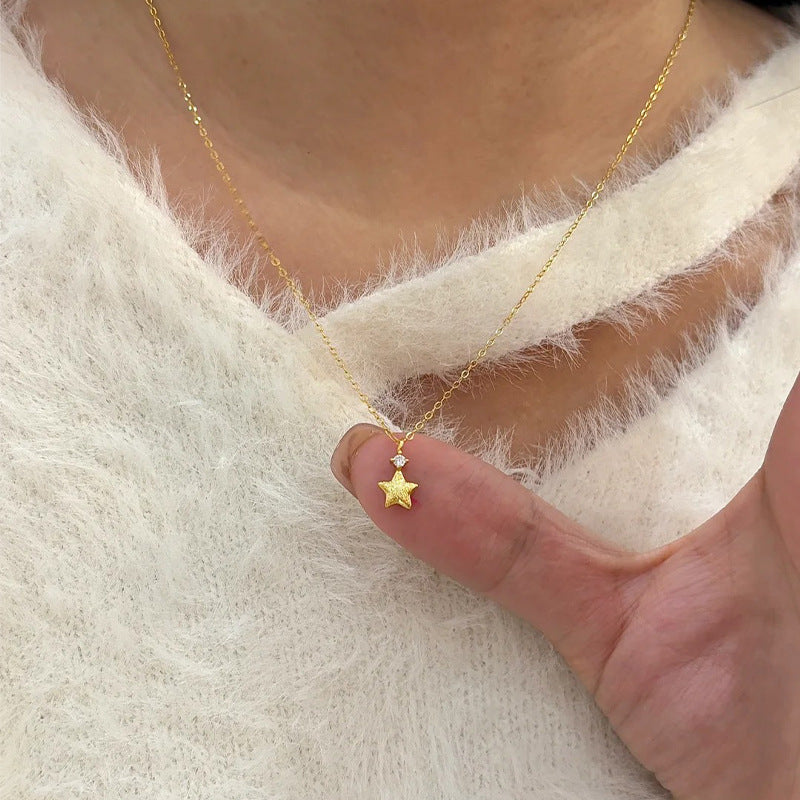 Damen Halskette mit funkelndem Sternanhänger und feiner Gliederkette Shop Nory