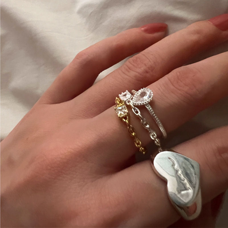 Damenring mit filigranem Kettendesign und funkelndem Kristall Shop Nory