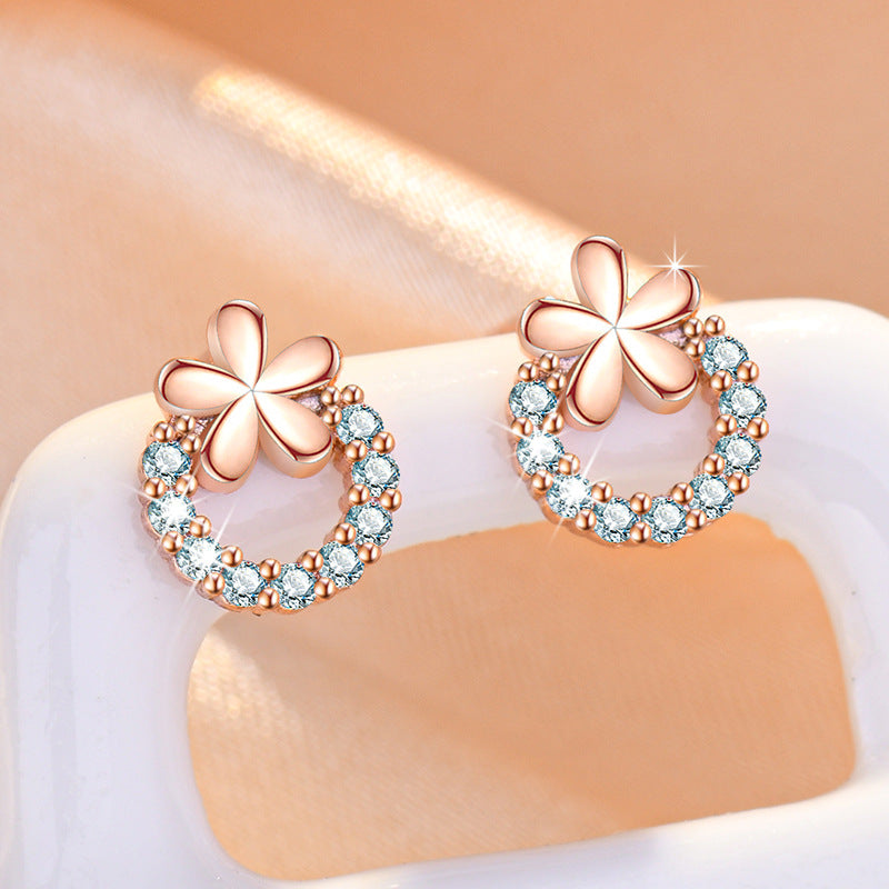 Damen Funkelnde Ohrringe mit floralem Design und Zirkonia-Besatz Shop Nory