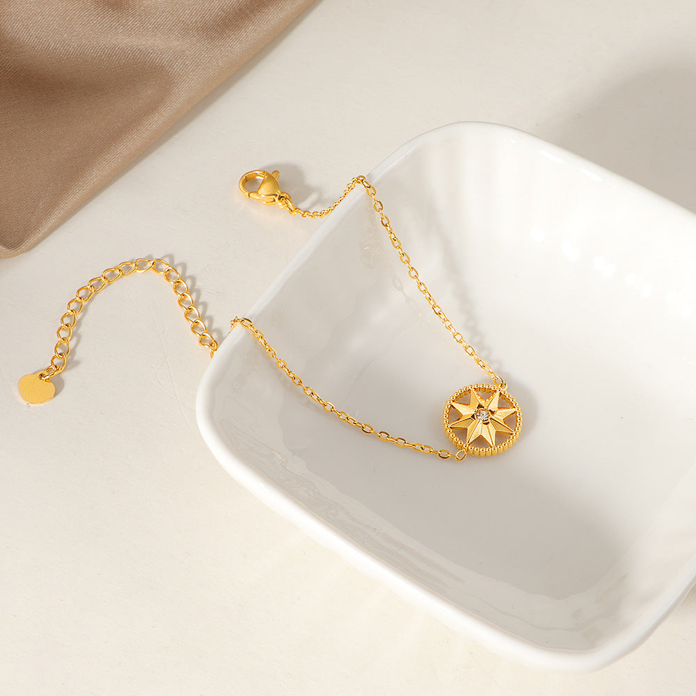 Frauen Kompass-inspirierte Charm-Armbanduhr Shop Nory