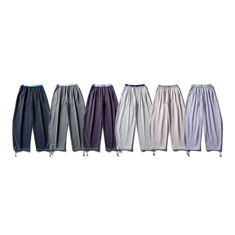 Unisex Weite Tech-Jogginghose mit Kordelzug, Kontrastnähten und verstellbarem Saum Shop Nory