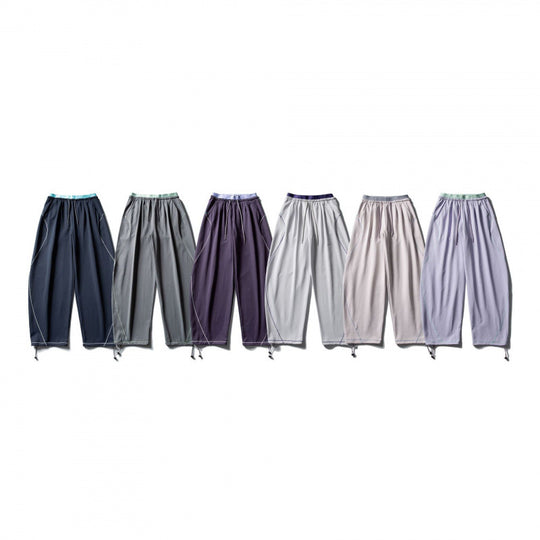 Unisex Weite Tech-Jogginghose mit Kordelzug, Kontrastnähten und verstellbarem Saum Shop Nory