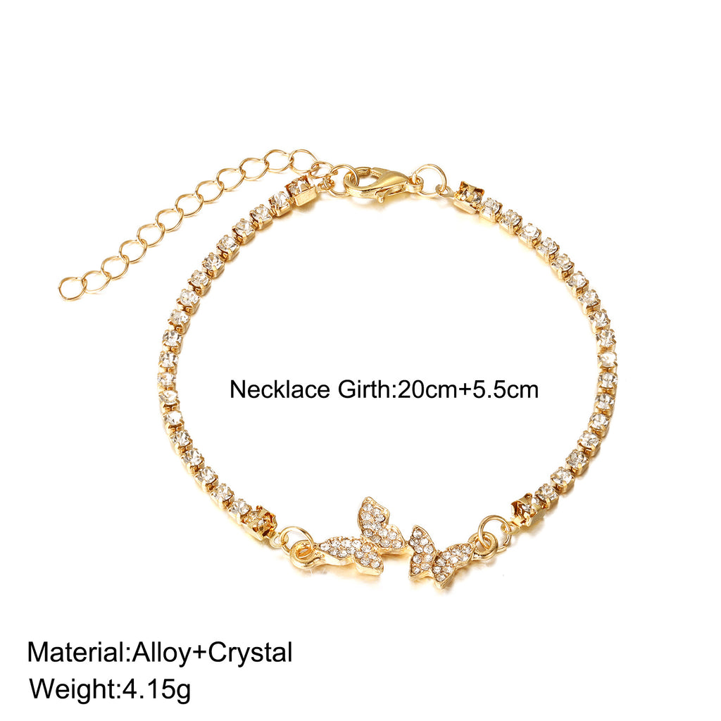 Damenarmband mit funkelnden Schmetterlingsanhängern Shop Nory