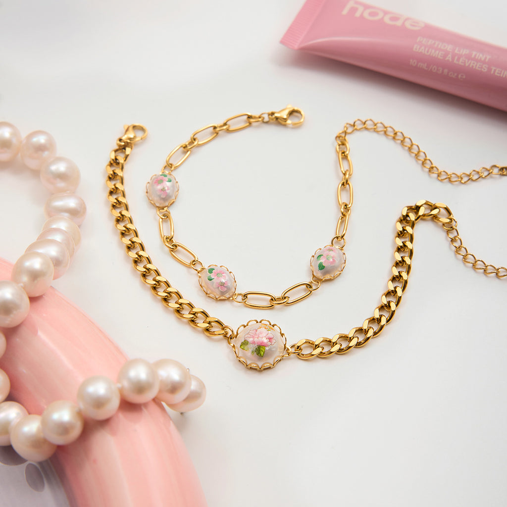 Damen Edelstahlarmband mit floralem Design und verstellbarem Verschluss Shop Nory