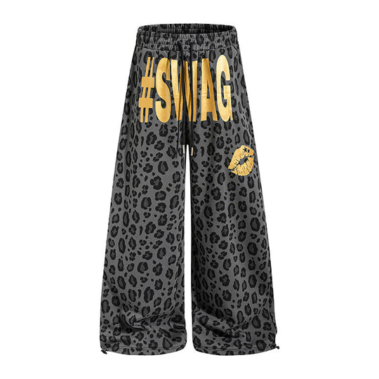 Damen Weite Palazzo-Sweathose im Leo-Muster mit hohem Komfortbund, Kordelzug und goldigem Statement-Print Shop Nory