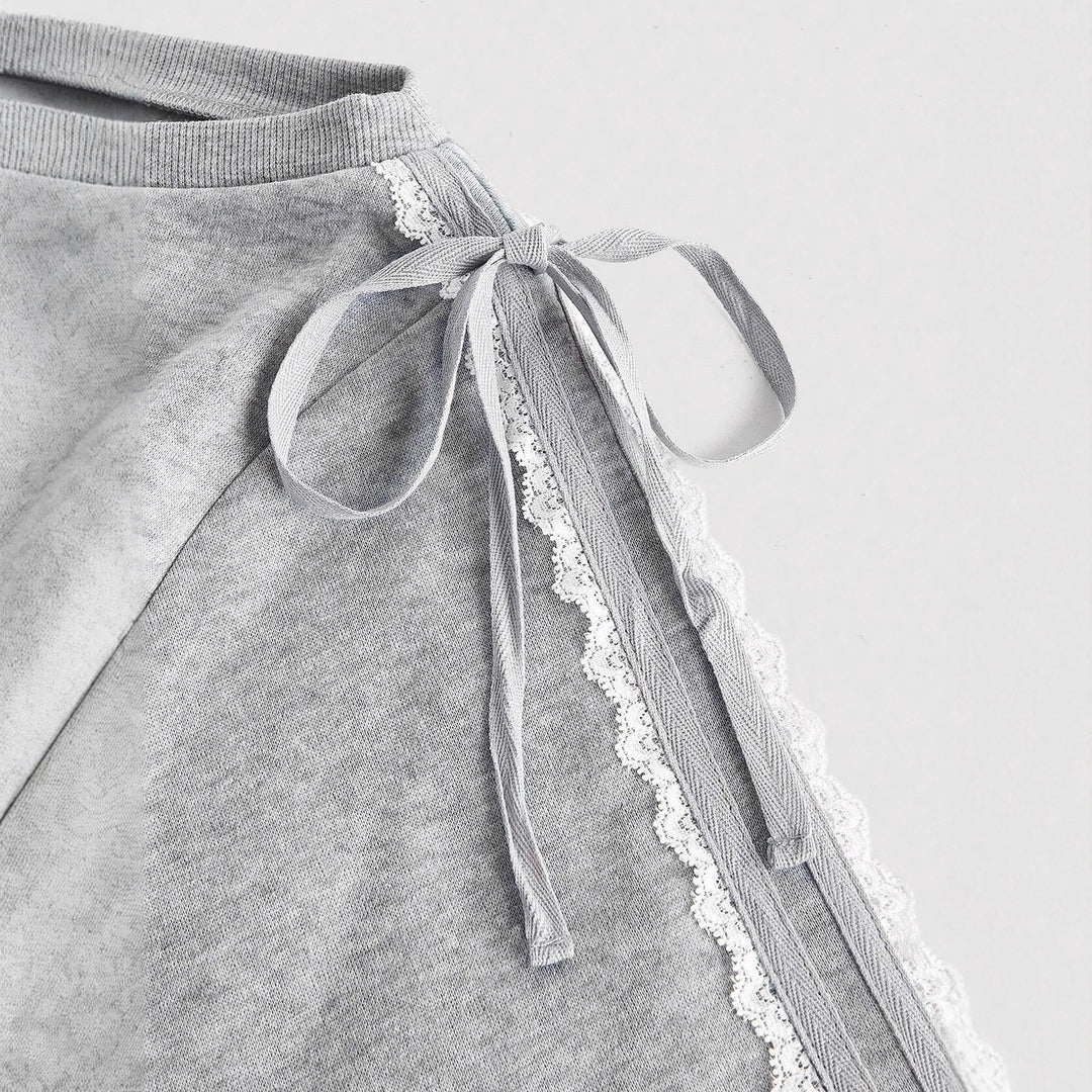 Damen Kurzgeschnittenes One-Shoulder Sweatshirt mit Ballonärmeln und Schnürdetail Shop Nory