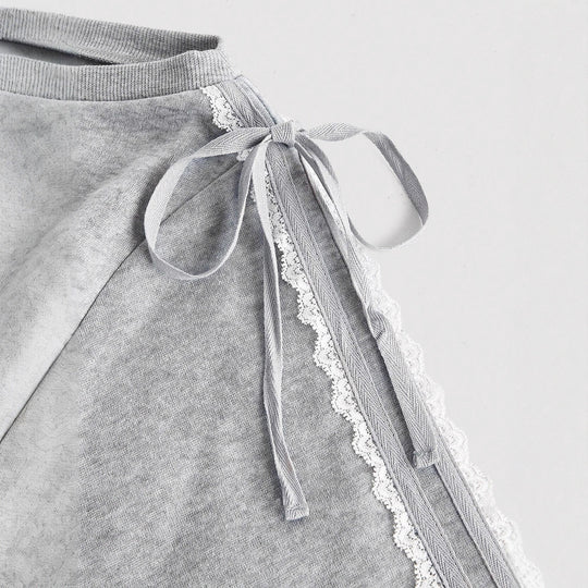 Damen Kurzgeschnittenes One-Shoulder Sweatshirt mit Ballonärmeln und Schnürdetail Shop Nory