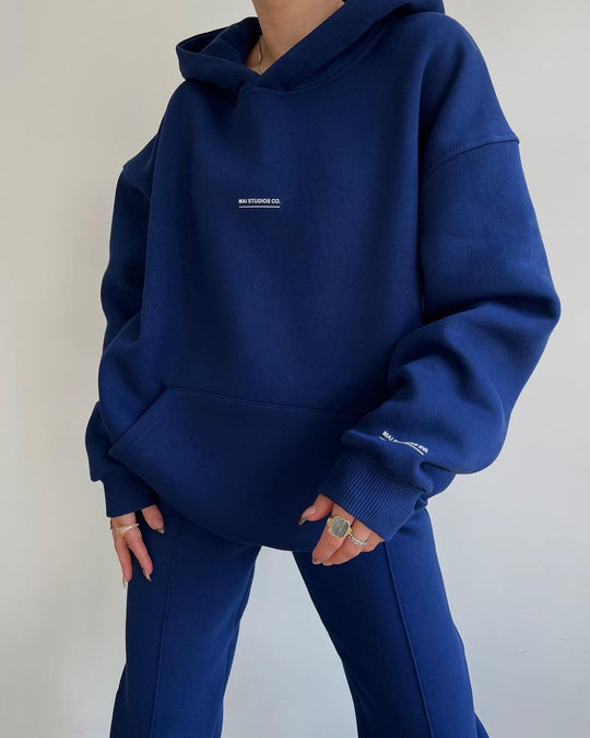 Damen Set Schwere French‑Terry Oversize‑Kapuzenpullover mit Kängurutasche und Slim‑Jogginghose Shop Nory