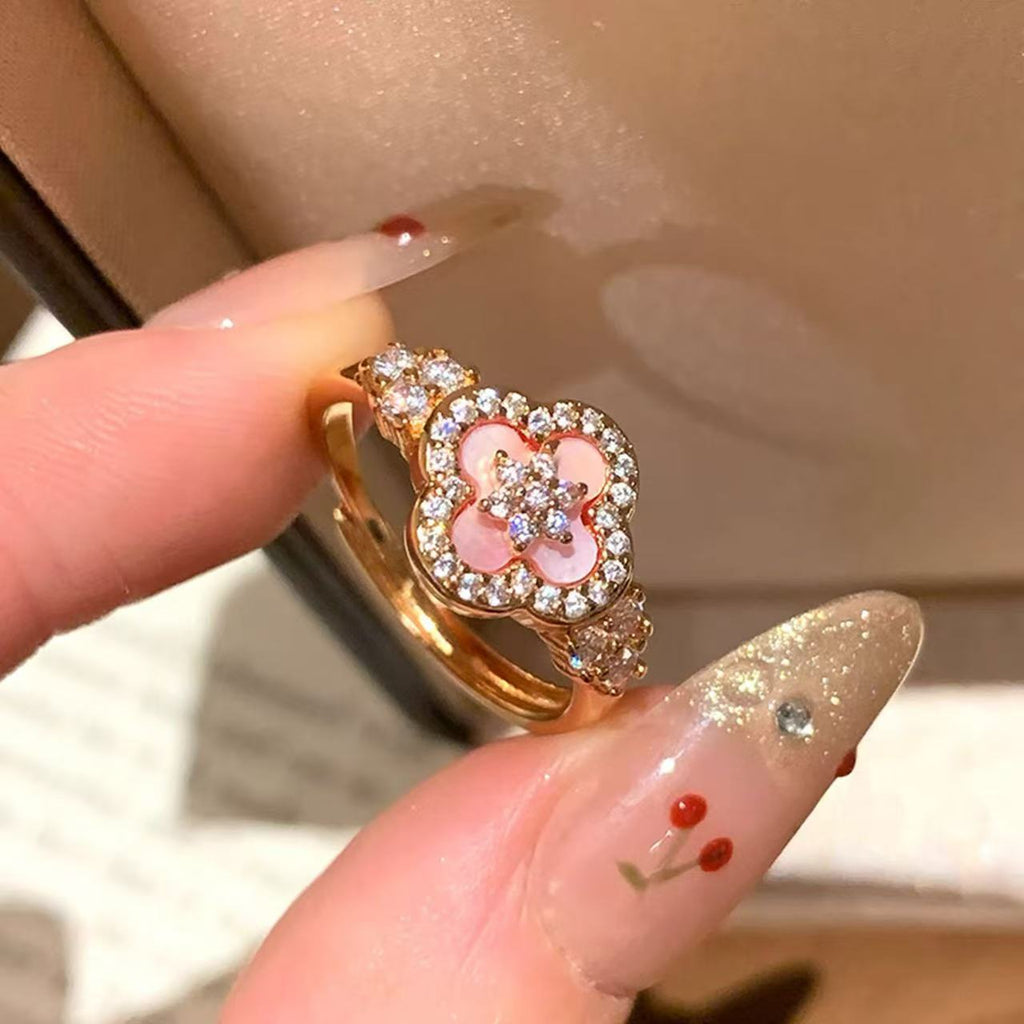 Damen blütenförmiger Schmuckring mit Zirkonia von Shop Nory