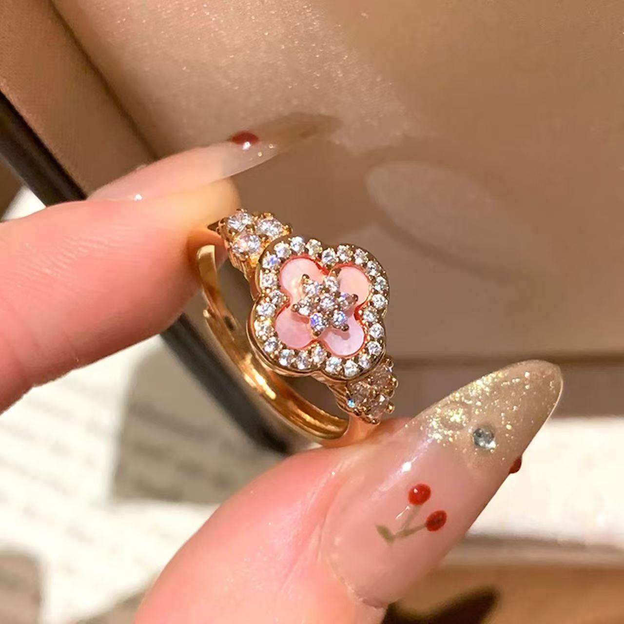 Damen blütenförmiger Schmuckring mit Zirkonia von Shop Nory