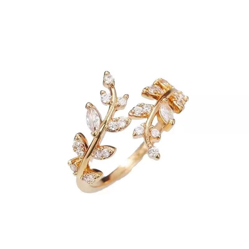 Damenring mit filigranem Blattdesign und funkelnden Zirkonia Shop Nory