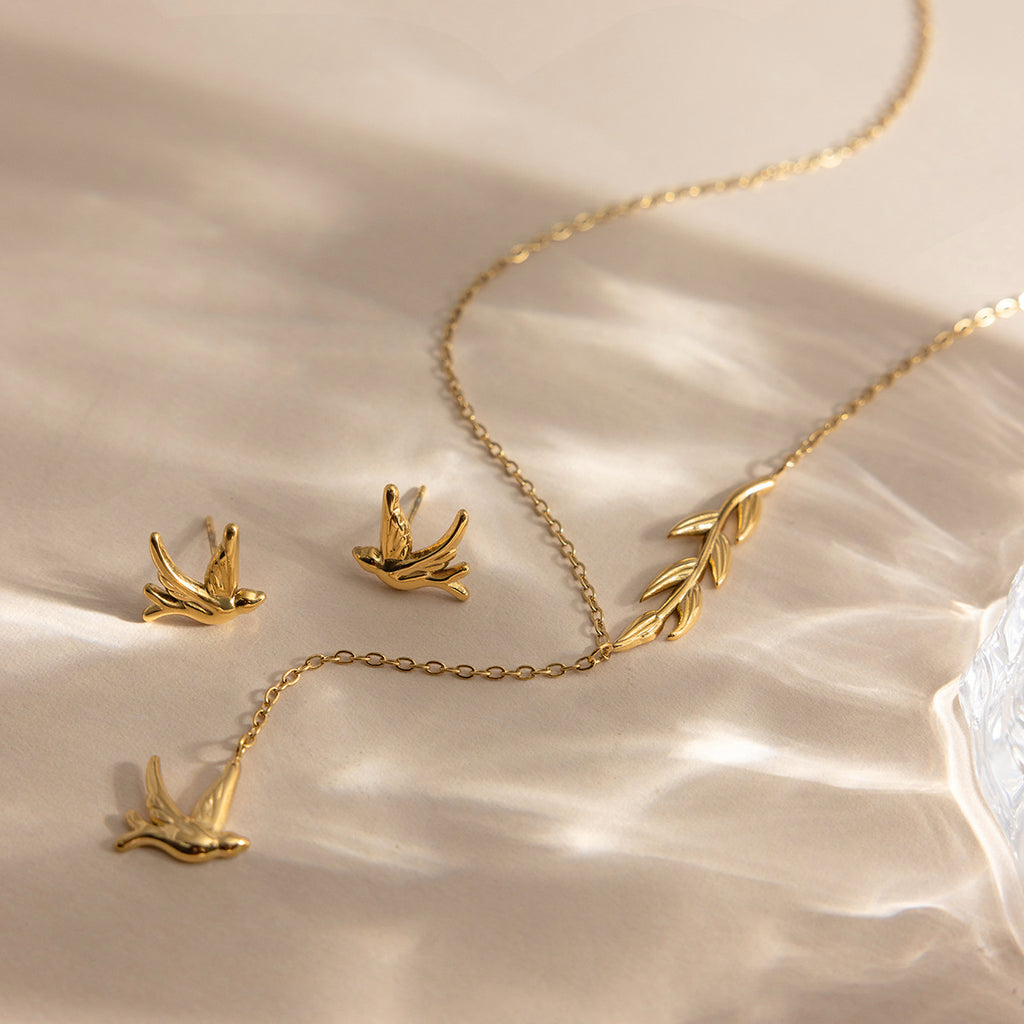 Damen Halskette mit Anhänger im eleganten Vogel-Design aus hypoallergenem Edelstahl Shop Nory