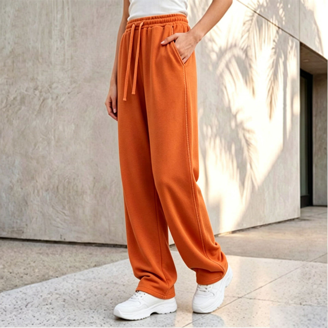 Damen nan weite Loungepalazzo-Hose mit hohem Komfortbund, Kordelzug, seitlichen Eingrifftaschen und dekorativer Seitennaht Shop Nory