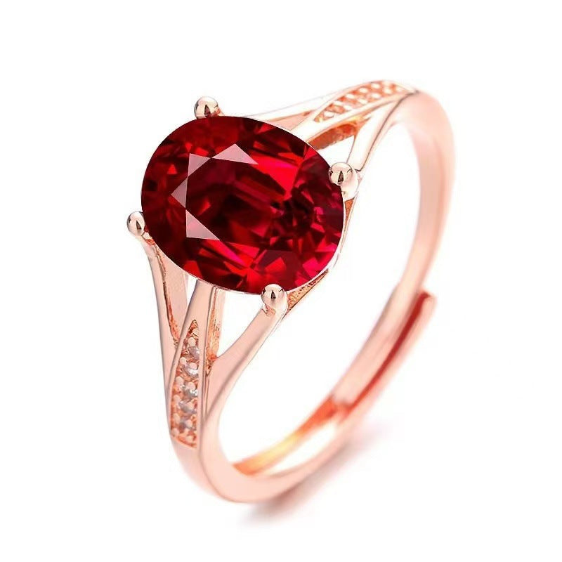Damenring mit funkelndem Rubin und zarten Zirkonia-Details Shop Nory