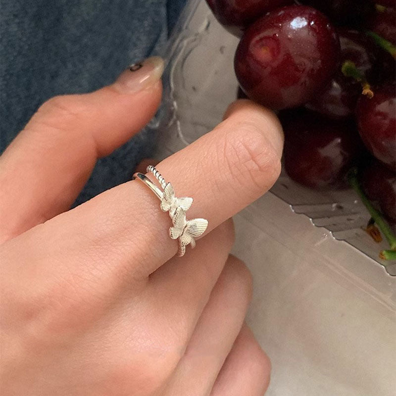 Damenring mit filigranem Schmetterlingsmotiv und romantischem Design Shop Nory