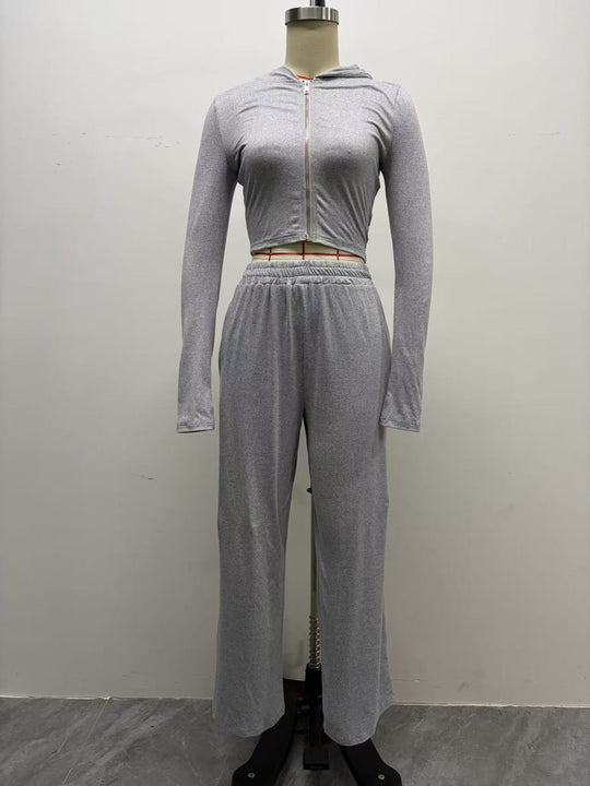 Damen Zweiteiliges Loungewear-Set geripptes Crop-Kapuzenoberteil mit Reißverschluss und Daumenloch sowie weiter Jogginghose Shop Nory